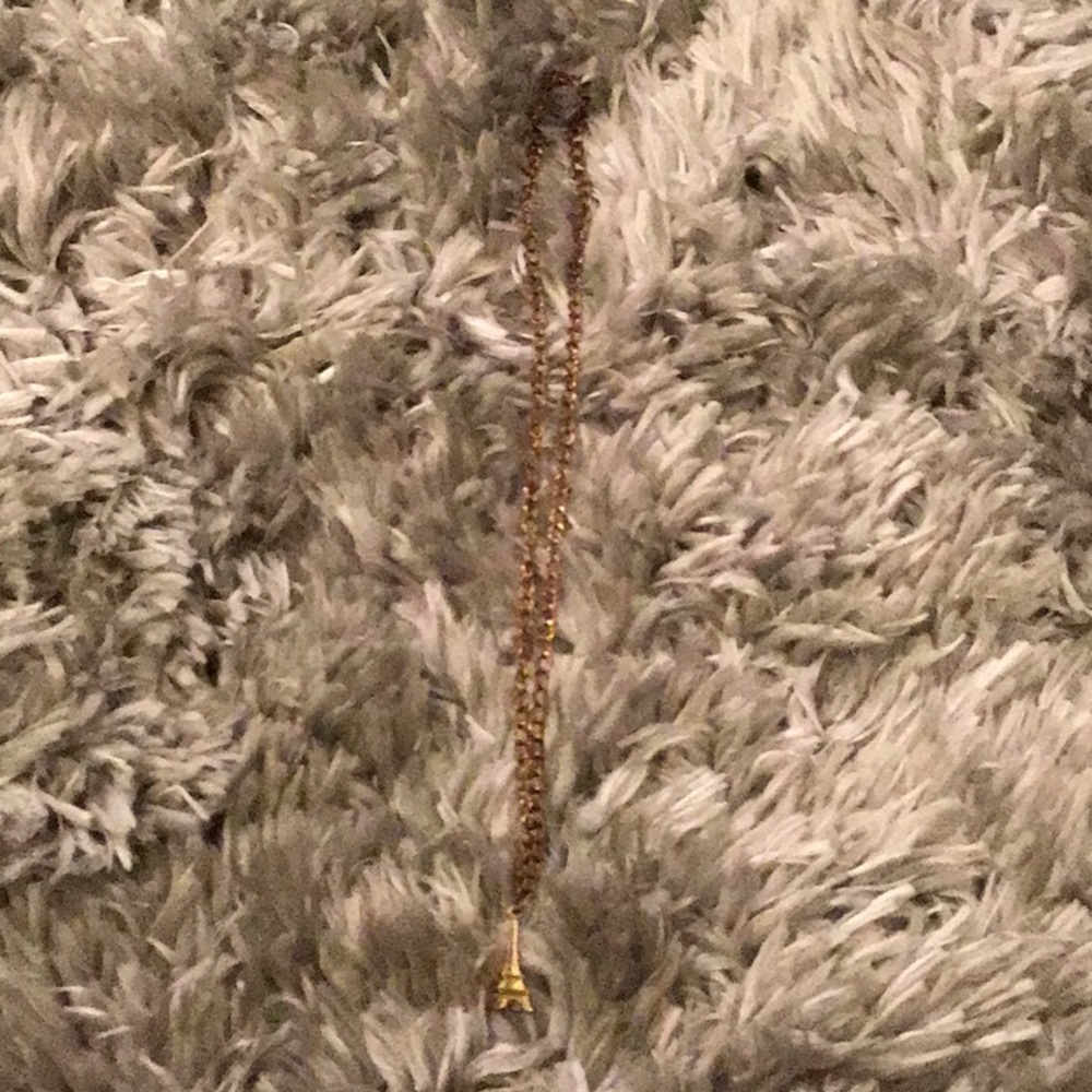 Gold Eiffel Tower necklace